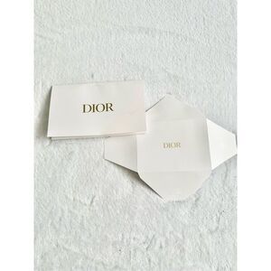 White and gold Dior envelope ￼